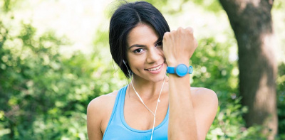 Female runner wearing a smart watch