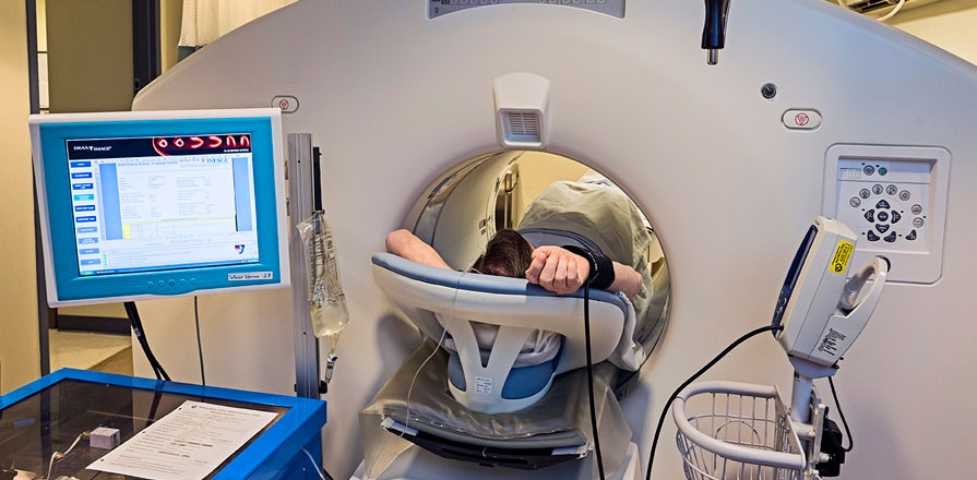 A patient inside a PET scan machine