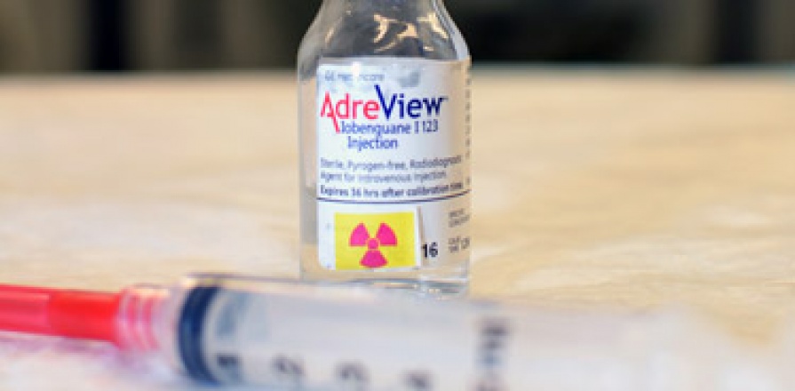 Bottle of AdreView and seringe.