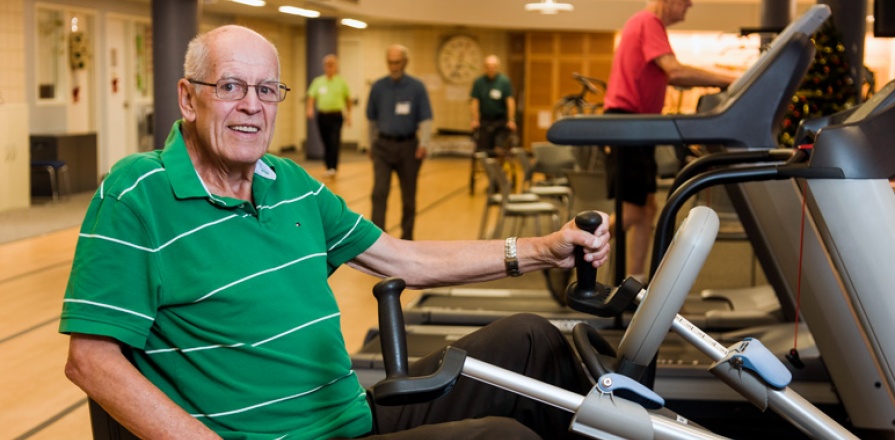 Cardiac rehabilitation patient on a stationary bicycle